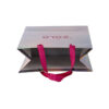 Surface reflective drawstring fashionable white cardboard tote bag - Image 2